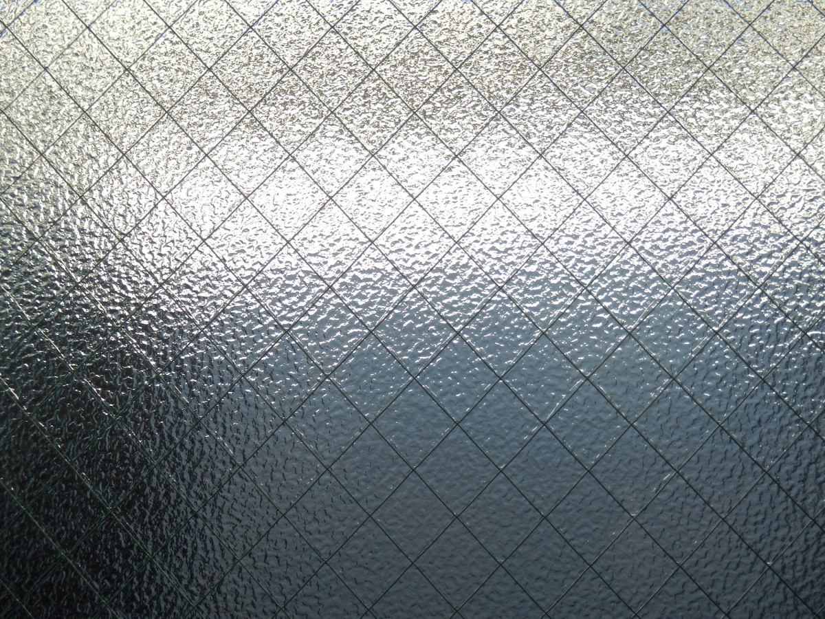 metal mesh lamination, metal mesh glass, metal mesh laminated glass, laminated glass metal mesh, metal mesh lamination services